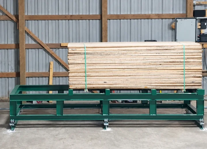 VisionTallyHD platform installation with a lumber bundle positioned between two scanner enclosures